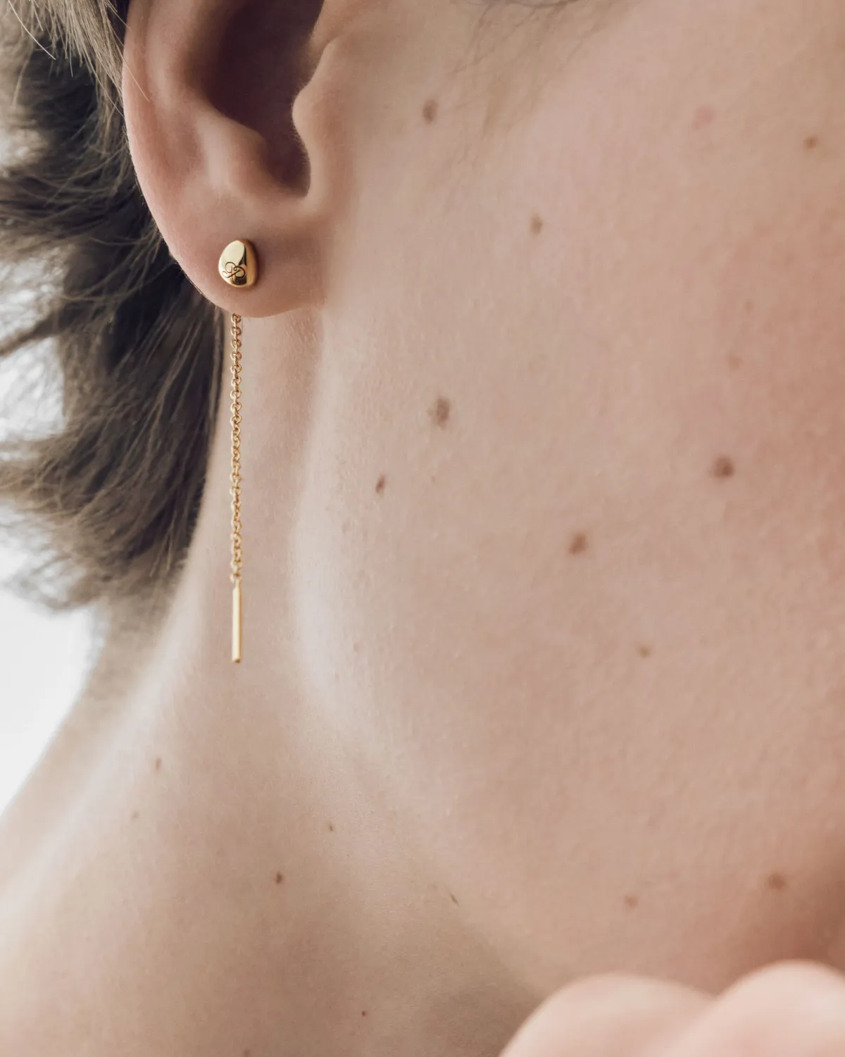 PDPAOLA Lyra boucles d'oreilles dorées longues