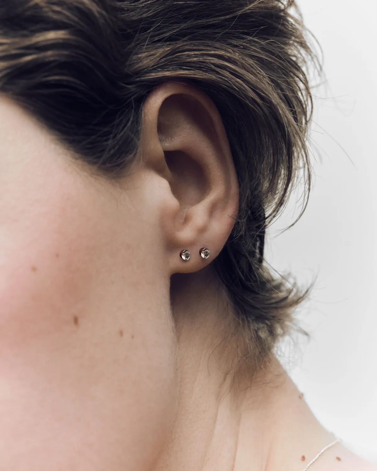 PDPAOLA Sira mono boucle diamant or blanc 18 carats