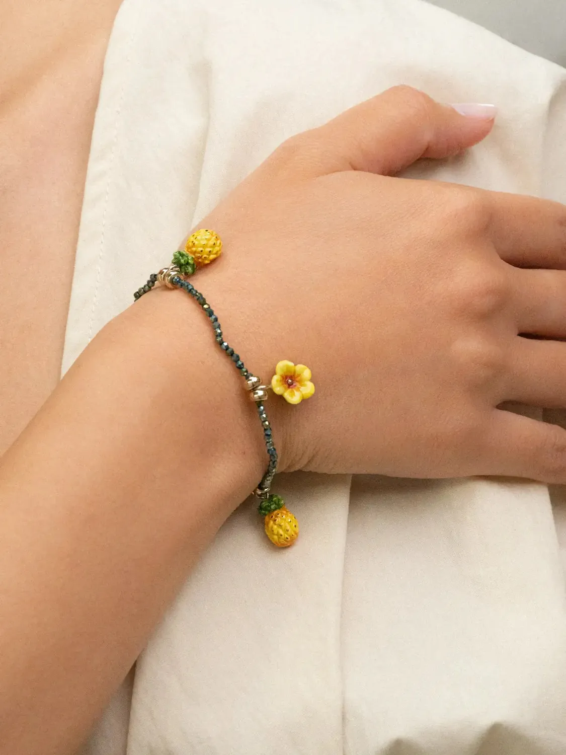 Nach Bijoux hibiscus ananas bracelet hématite élastique
