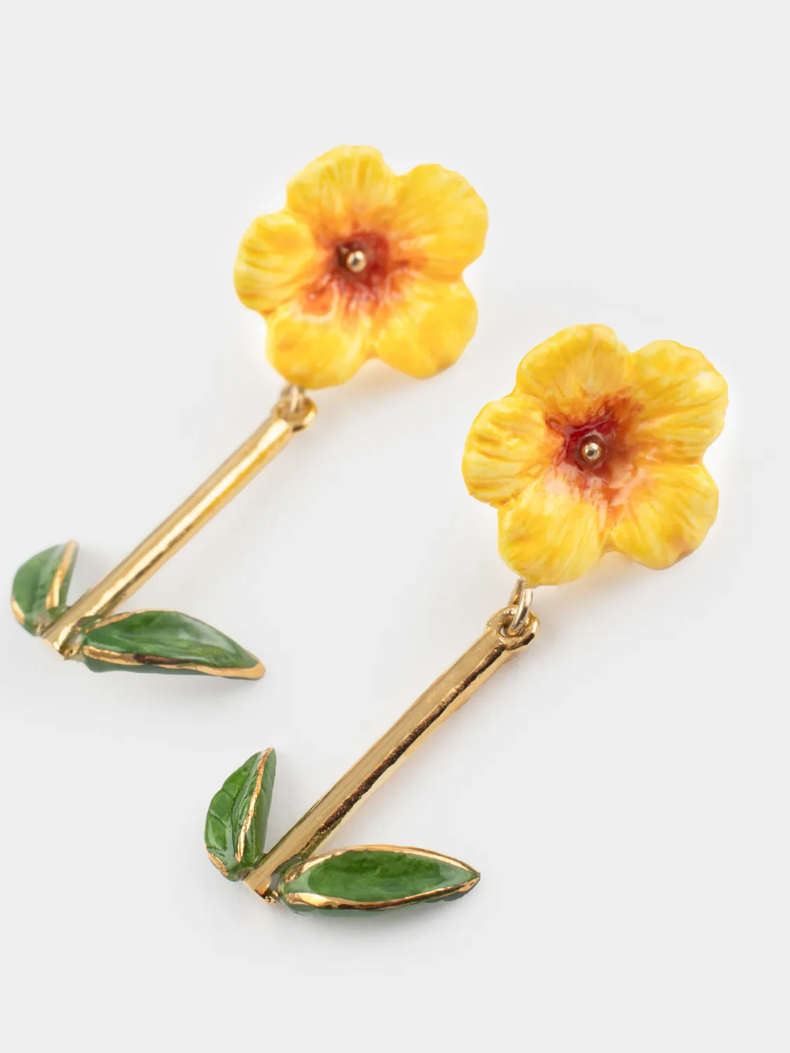 Nach Bijoux Hibiscus et feuilles boucles doreilles pendantes jaune