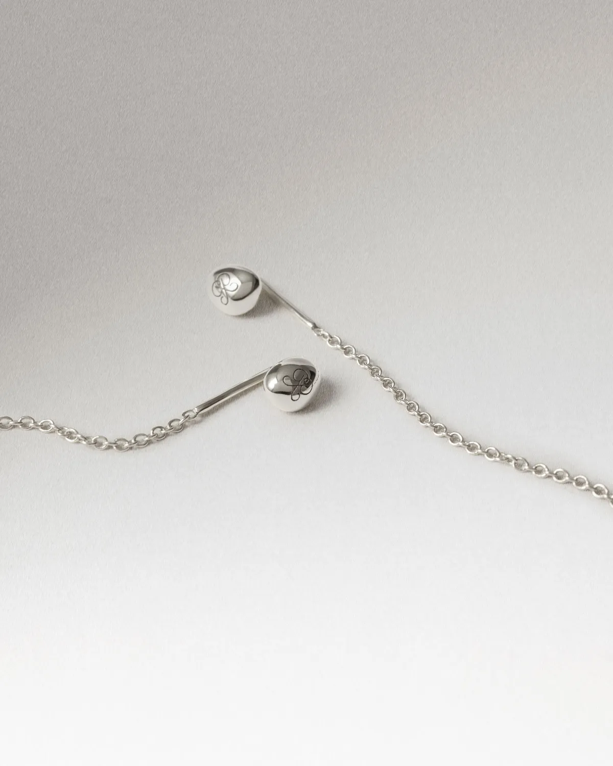 PDPAOLA Lyra boucles d’oreilles longues argent