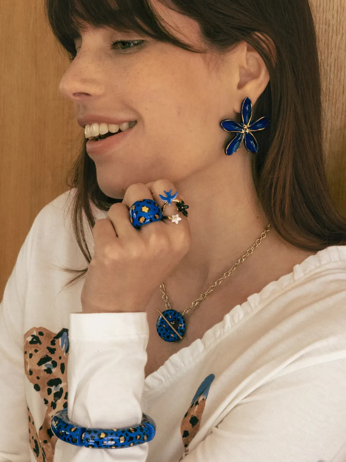 Nach Bijoux hirondelle bleue et fleurs bague ajustable dorée