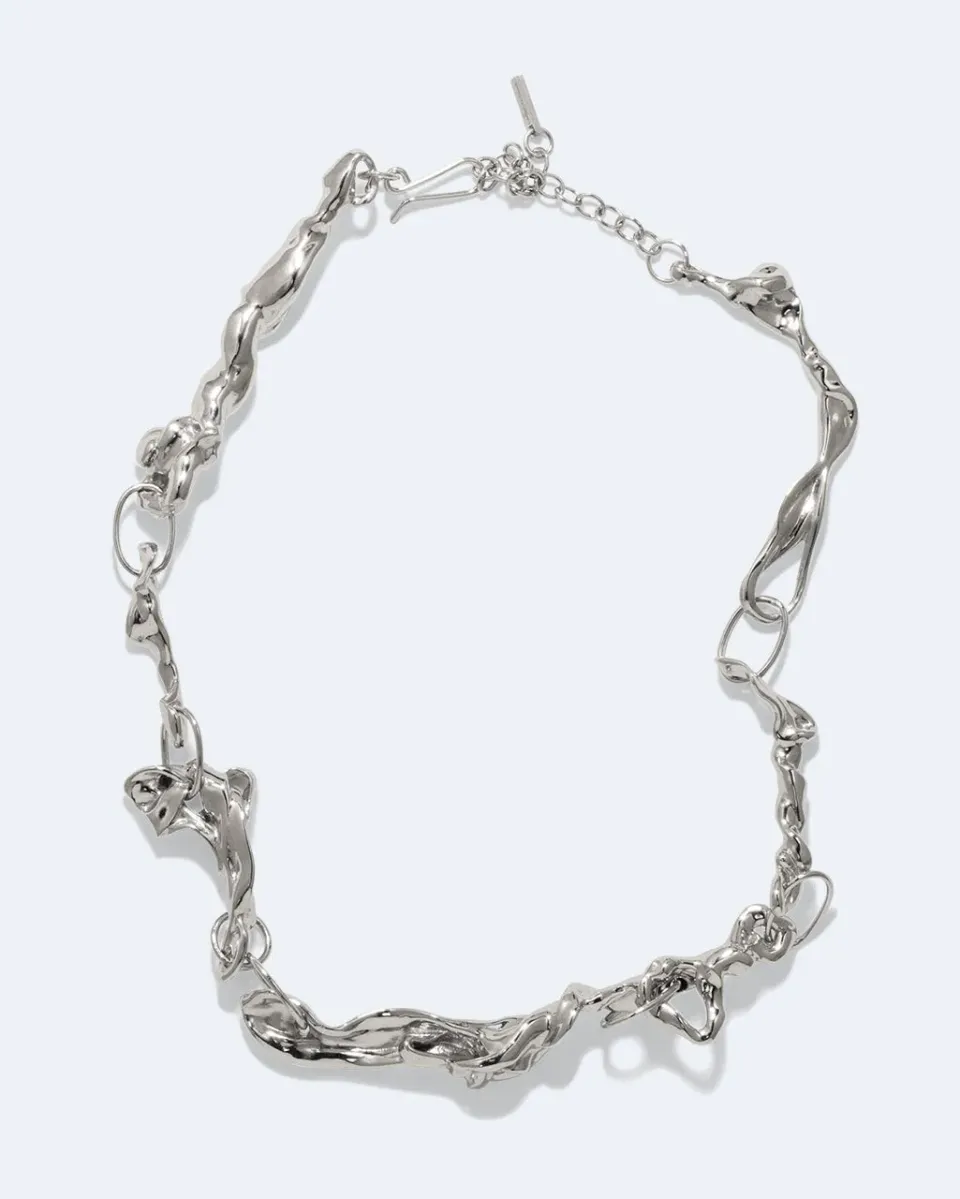 Completedworks Treacle collier ras de cou laiton rhodié