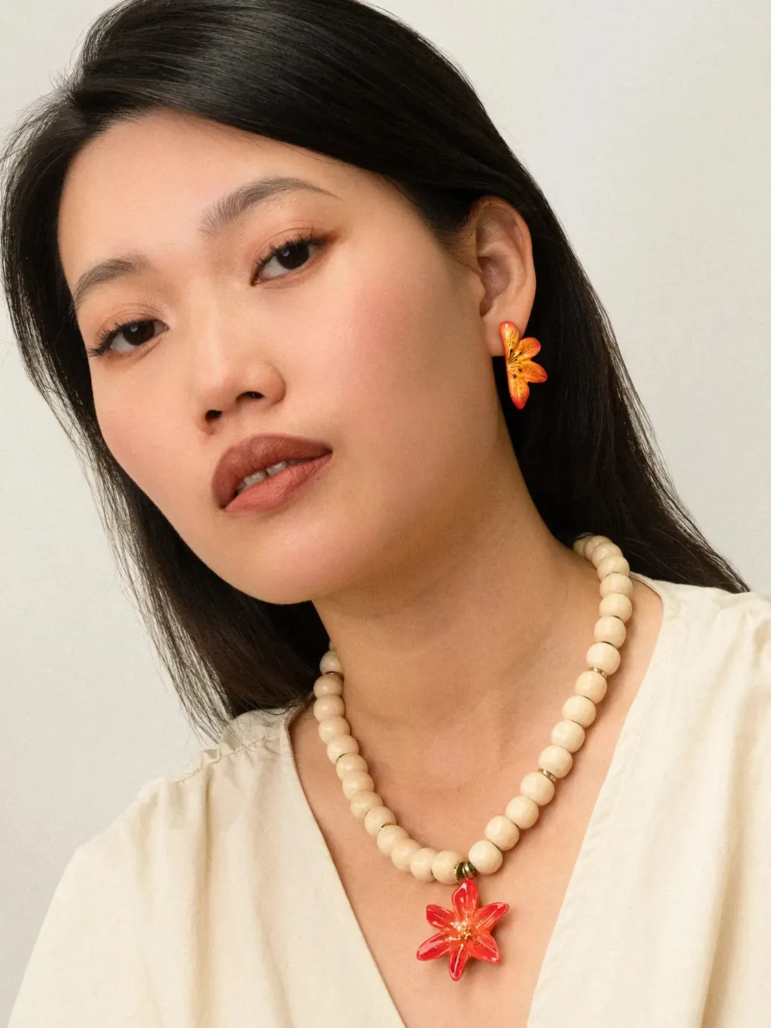 Nach Bijoux puces demi lys tigrée orange porcelaine