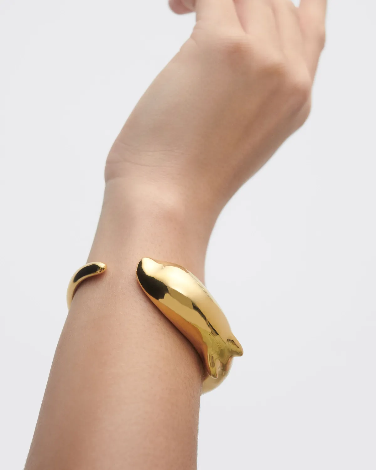 PDPAOLA Dolphin bracelet jonc doré 16 mm