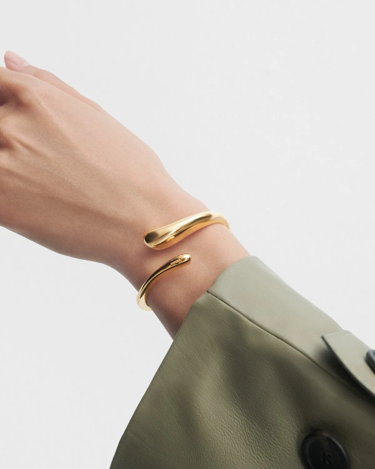 PDPAOLA Orbit bracelet jonc doré taille S