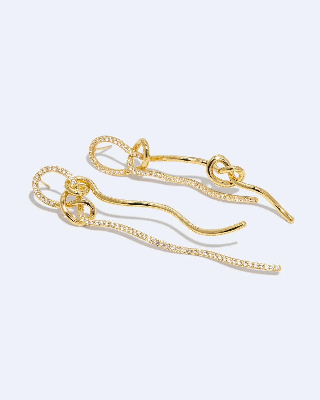 Completedworks Coil Not Even The Mathematician Can Create Things At Will boucles d’oreilles topaze blanche