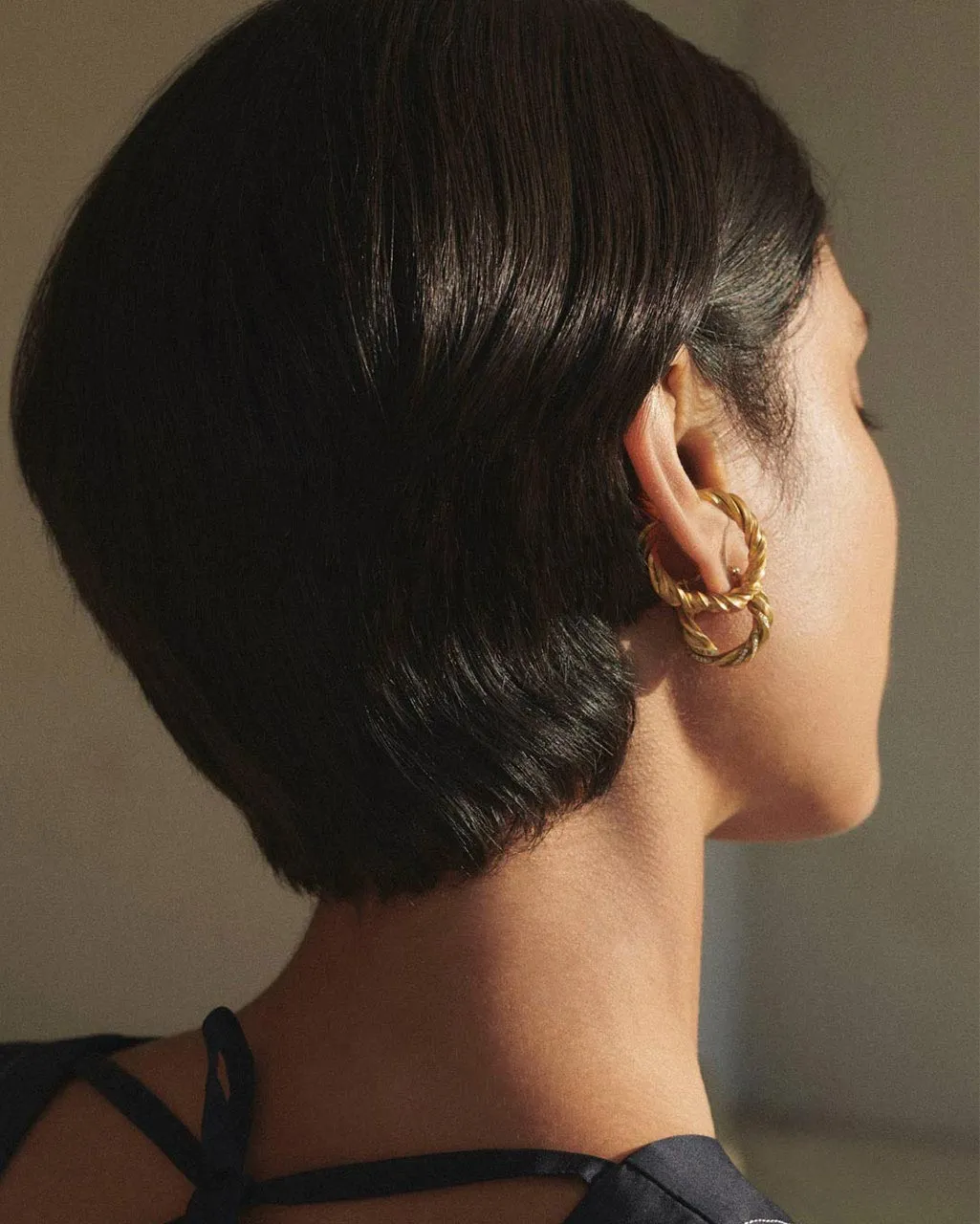 Completedworks Deep State ear cuff tissé vermeil doré