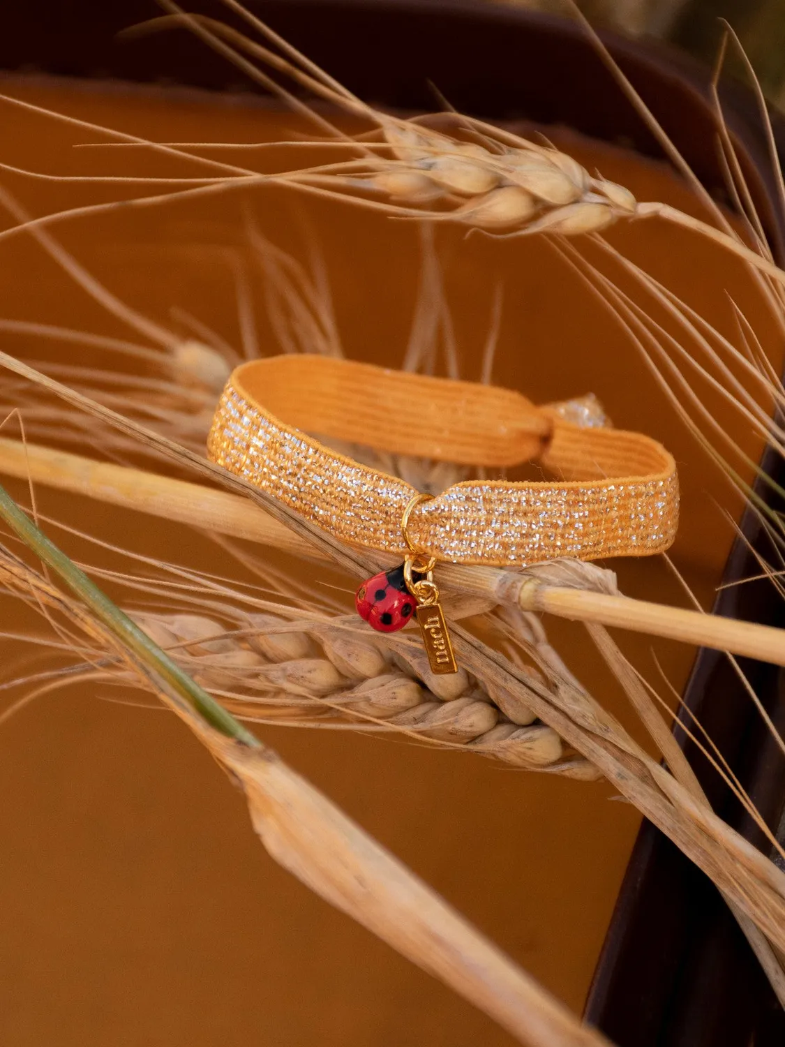 Nach Bijoux twistband bracelet orange coccinelle élastique