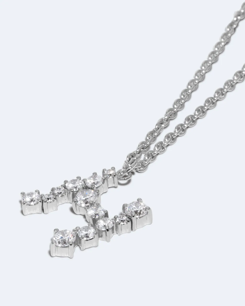 Completedworks Glitchy H collier pendentif zircone argenté