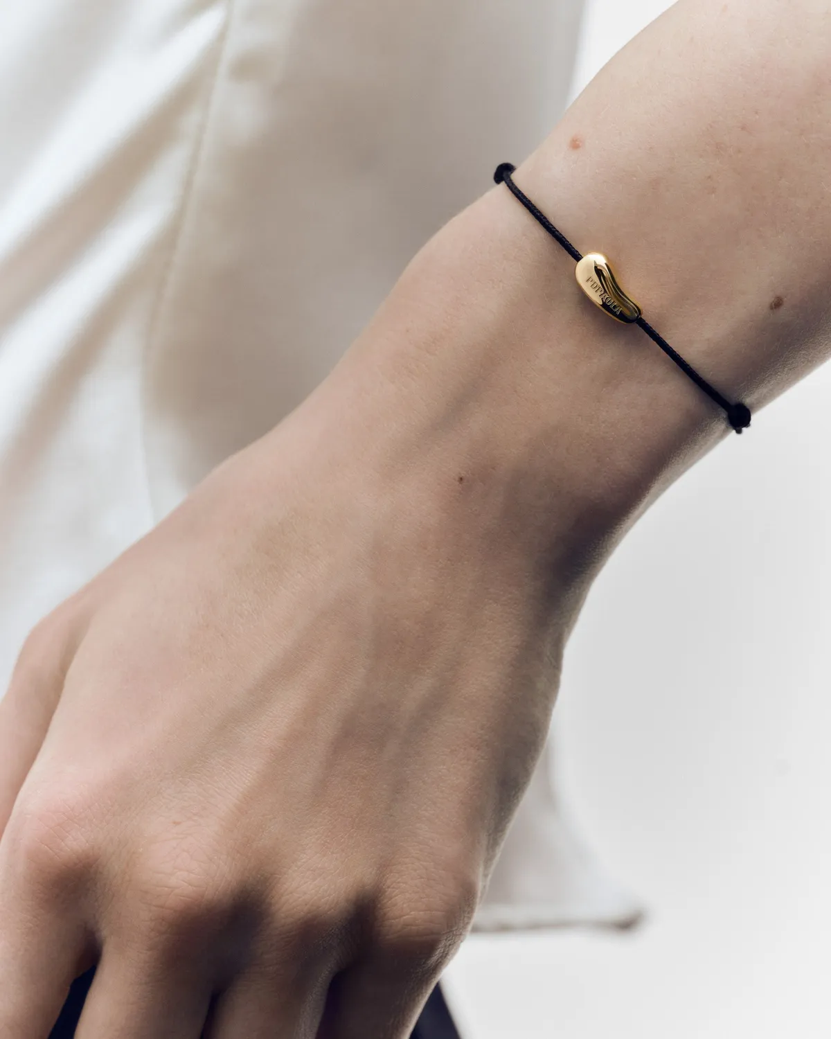 PDPAOLA Rodeo bracelet cordon noir doré