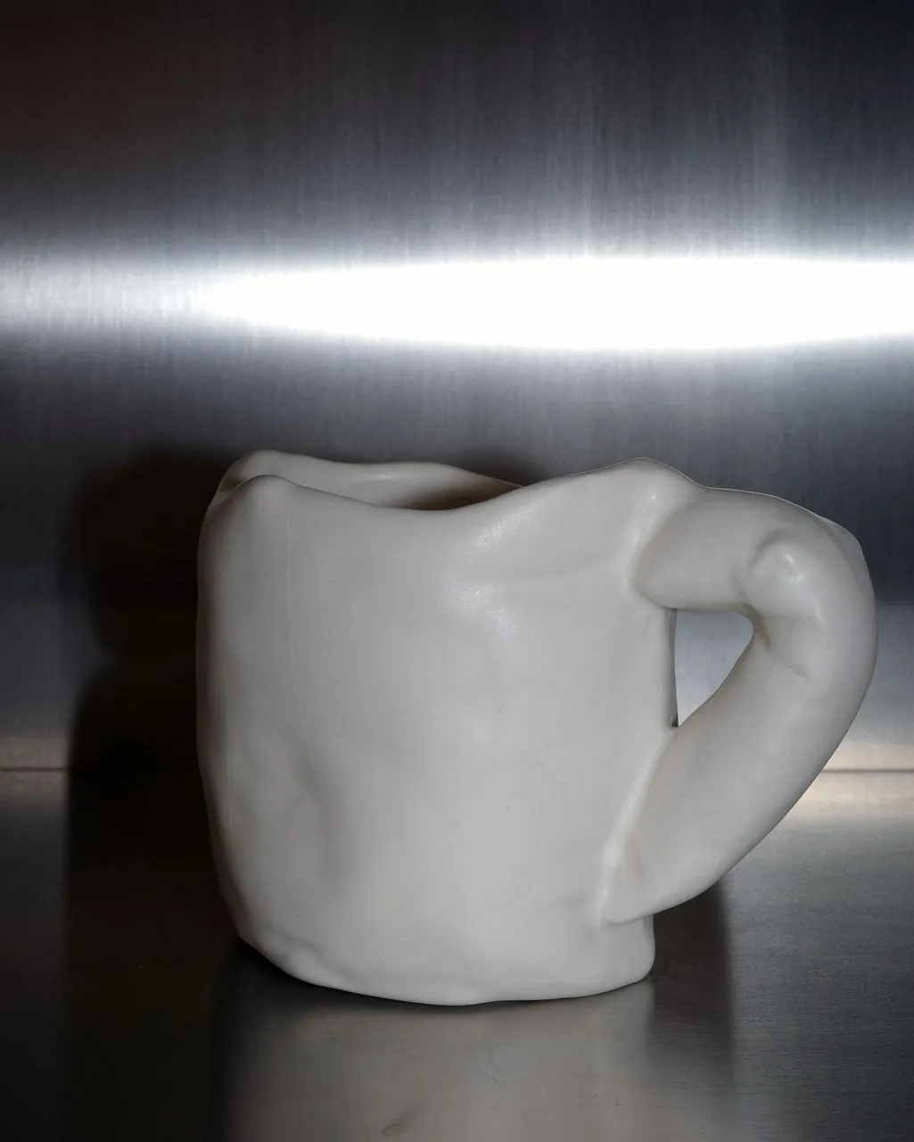 Completedworks Deflating mug céramique blanc mat