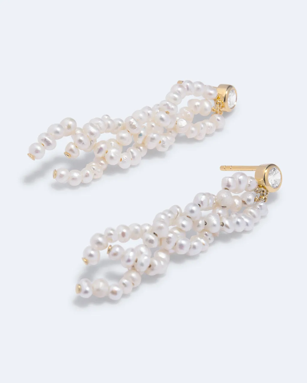 Completedworks Negotiation boucles perle zircon