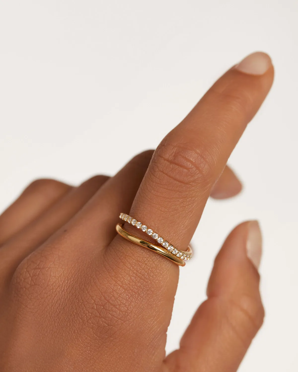PDPAOLA Essentials Twister bague plaqué or zircones