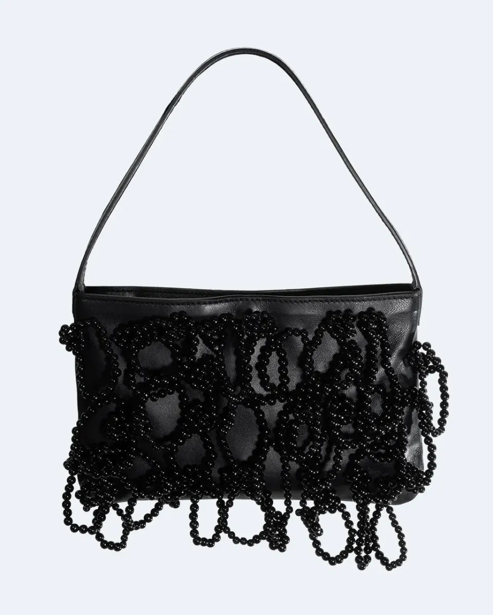 Completedworks The Pearly Pearl sac cuir noir perles