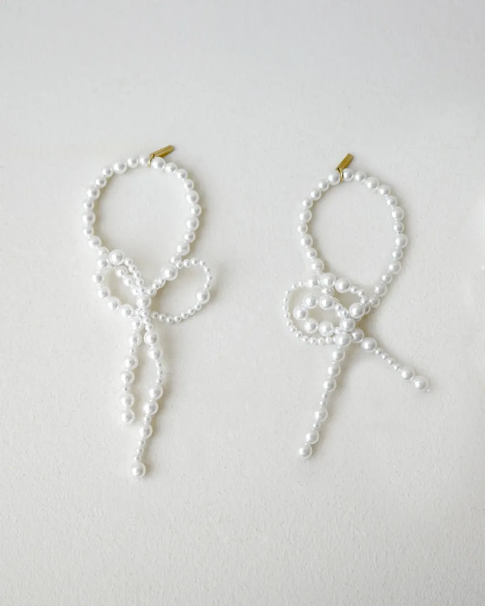 Completedworks Sit-Down lot 2 ronds serviette perles