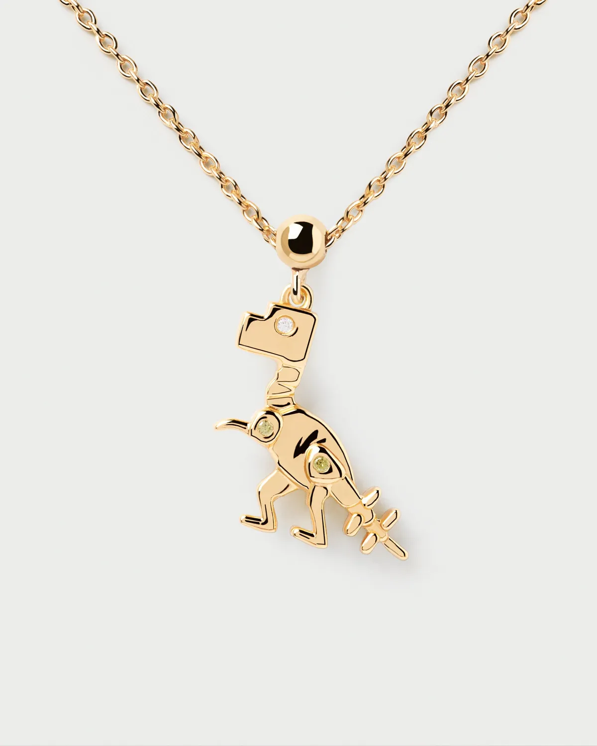 PDPAOLA Dino charm doré zircone blanche
