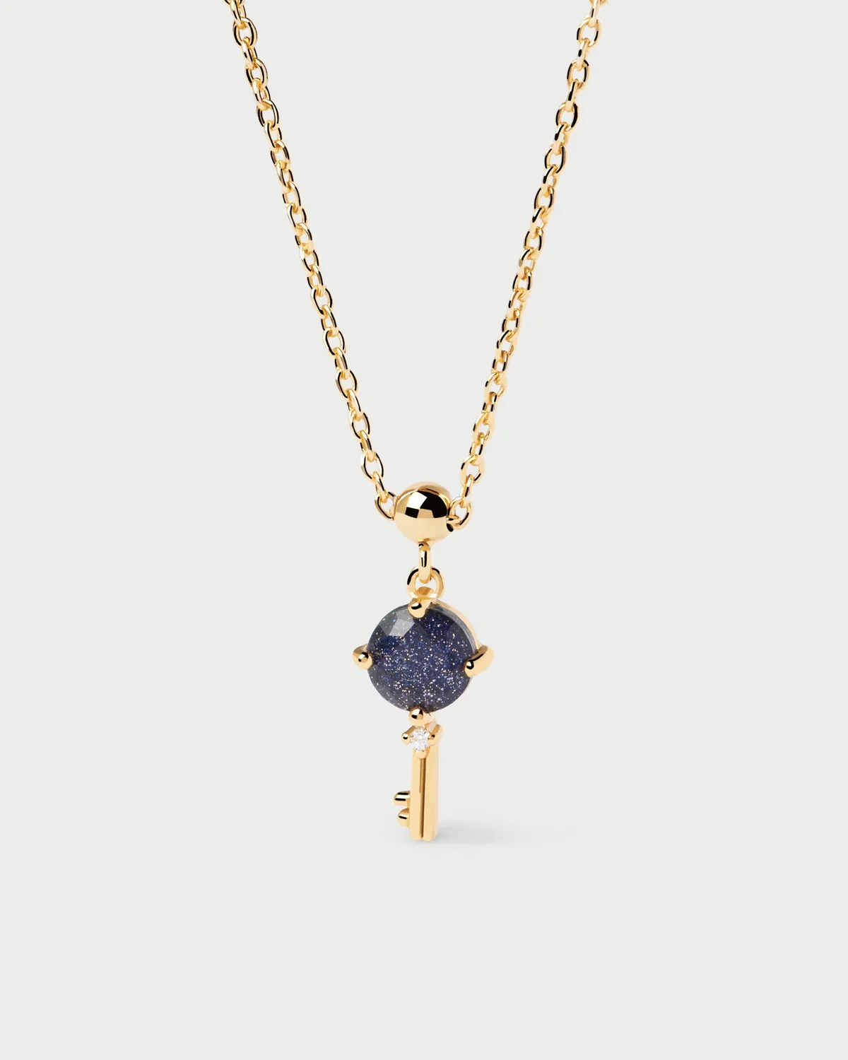 PDPAOLA The Key Charm breloque plaqué or pierre bleue