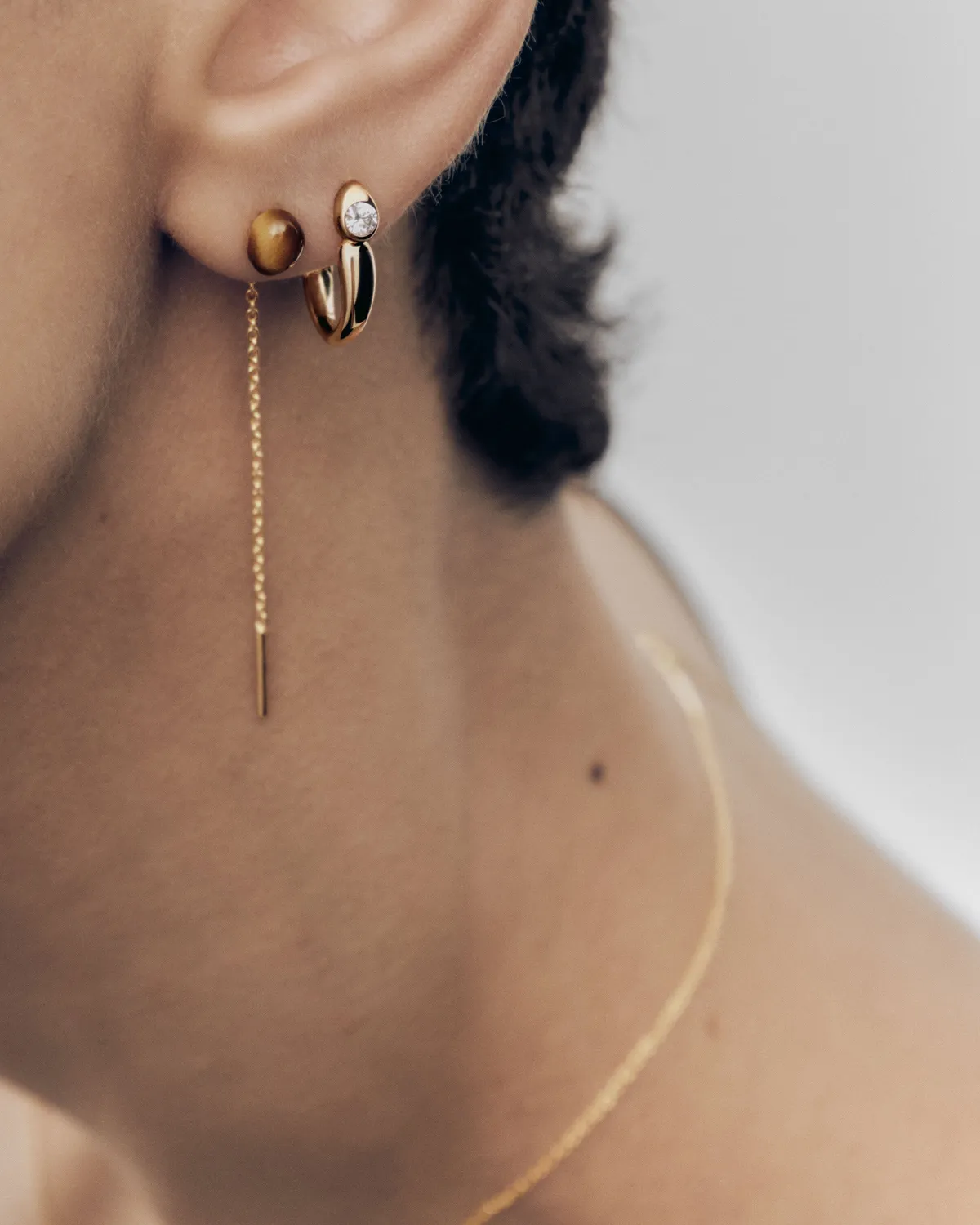 PDPAOLA Lyra Tiger Eye boucles longues 55 mm perle