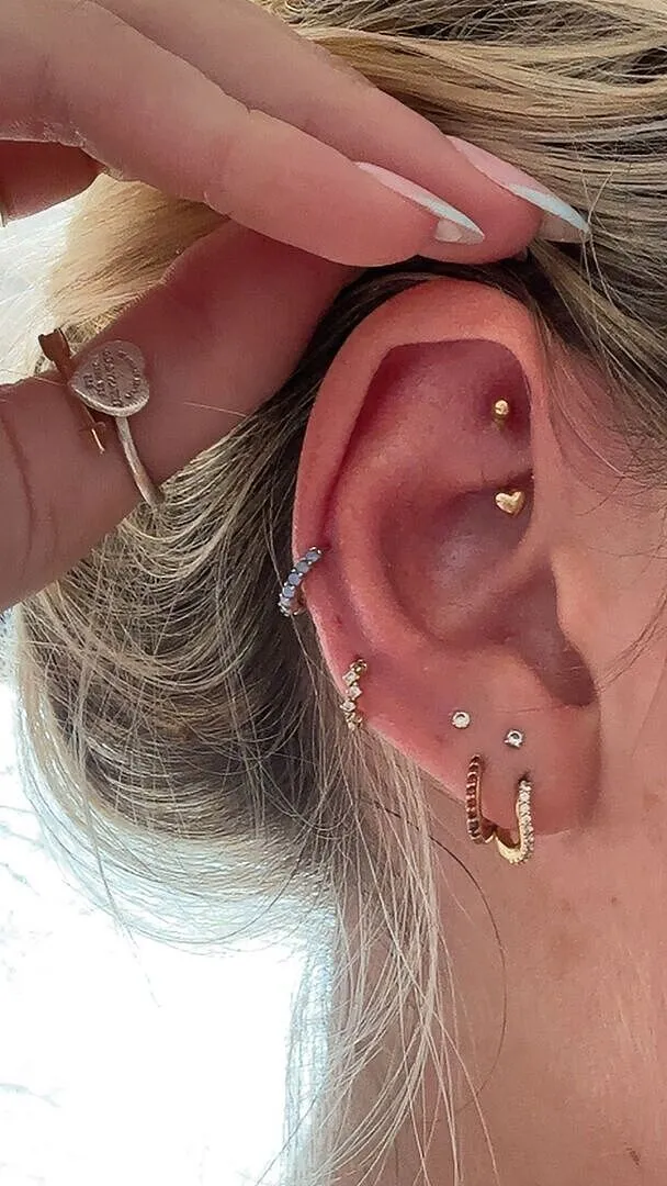 Astrid & Miyu Heart Rook Bar piercing or massif cœur