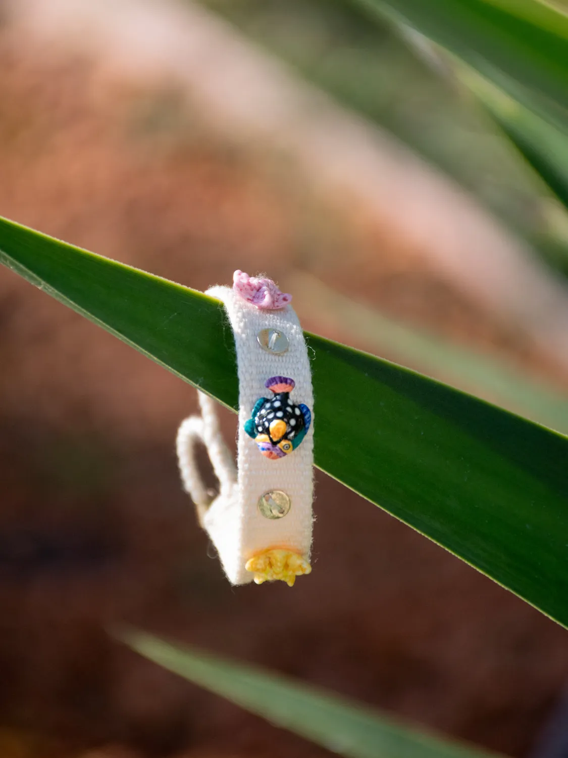 Nach Bijoux Aloha bracelet tressé beige à charms coton