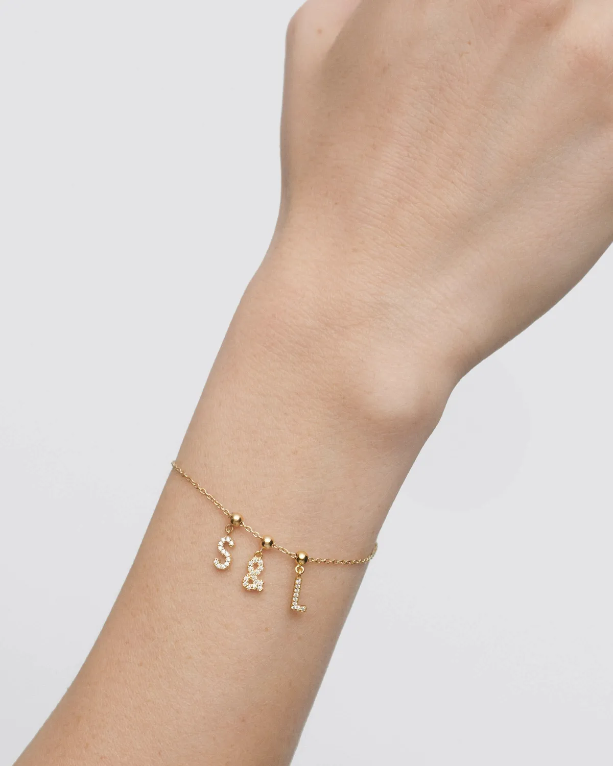 PDPAOLA Ampersand charm zirconia blanc doré