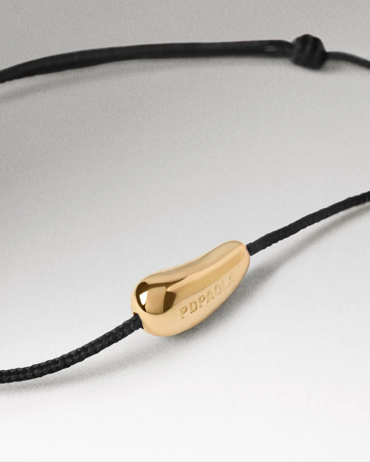 PDPAOLA Rodeo bracelet cordon noir doré