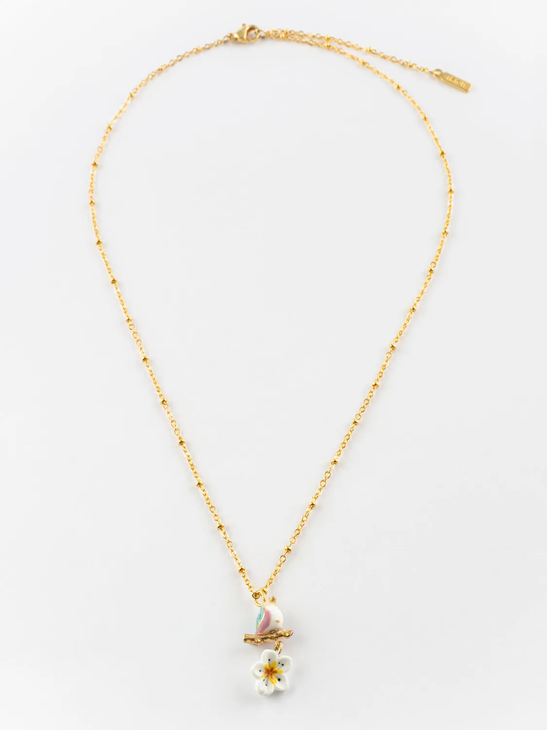 Nach Bijoux oiseau sur branche et fleur collier perles 48 cm