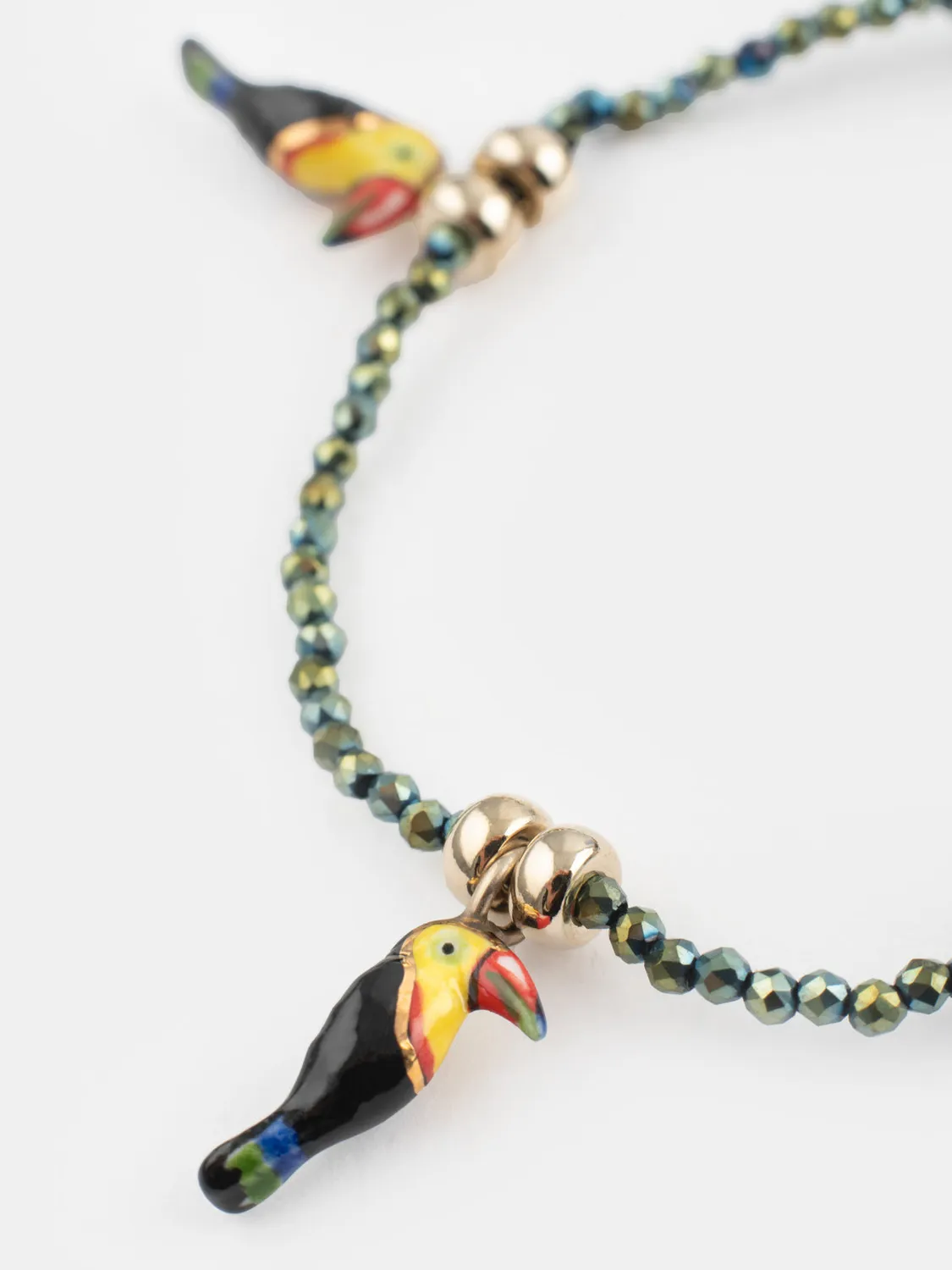 Nach Bijoux Toucans bracelet perles hématite élastique