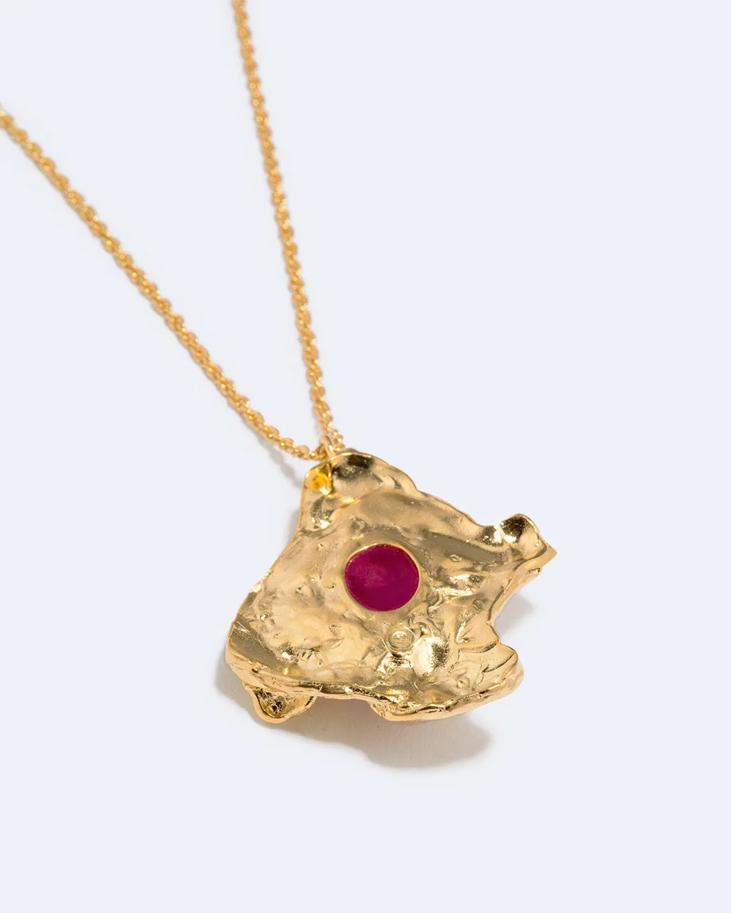 Completedworks Galileo pendentif résine rose plaqué or