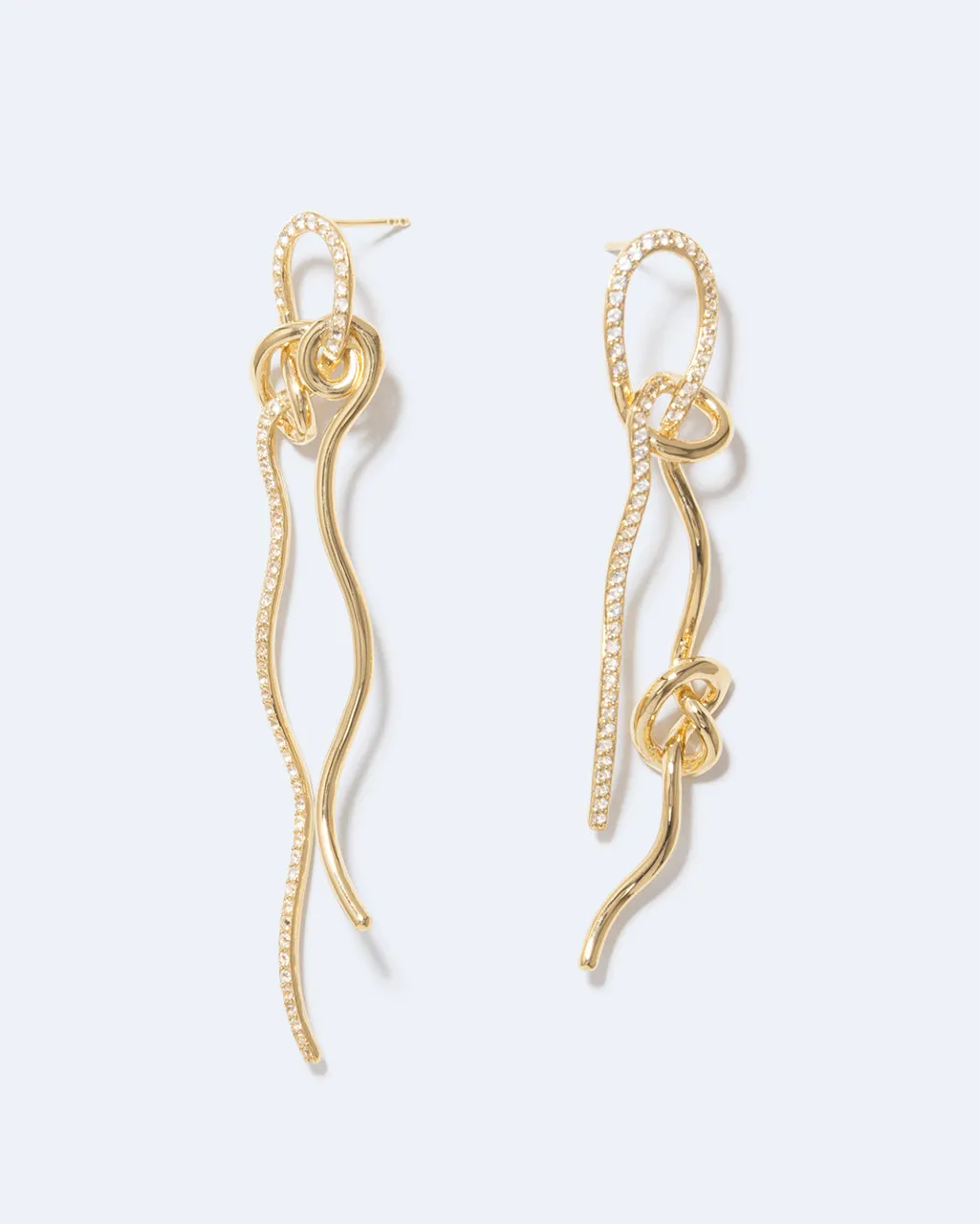 Completedworks Coil Not Even The Mathematician Can Create Things At Will boucles d’oreilles topaze blanche