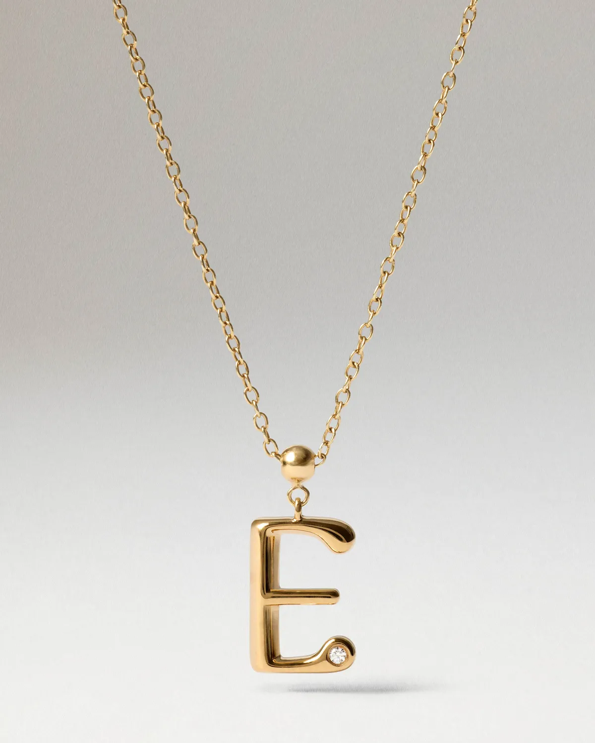 PDPAOLA Charms charm initiale E plaqué or zircon