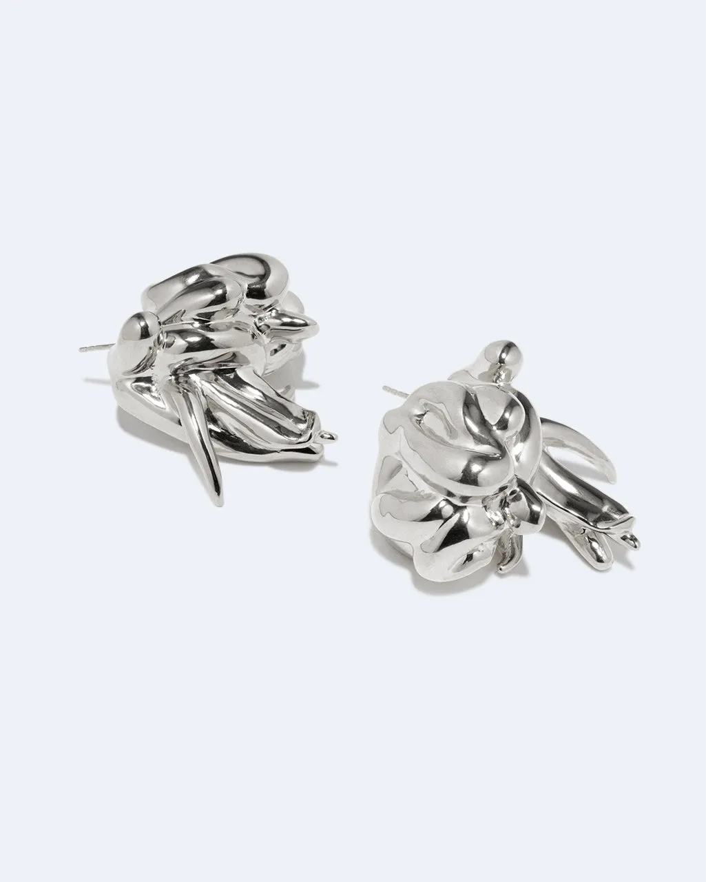 Completedworks General Strike boucles d’oreilles argent coulant