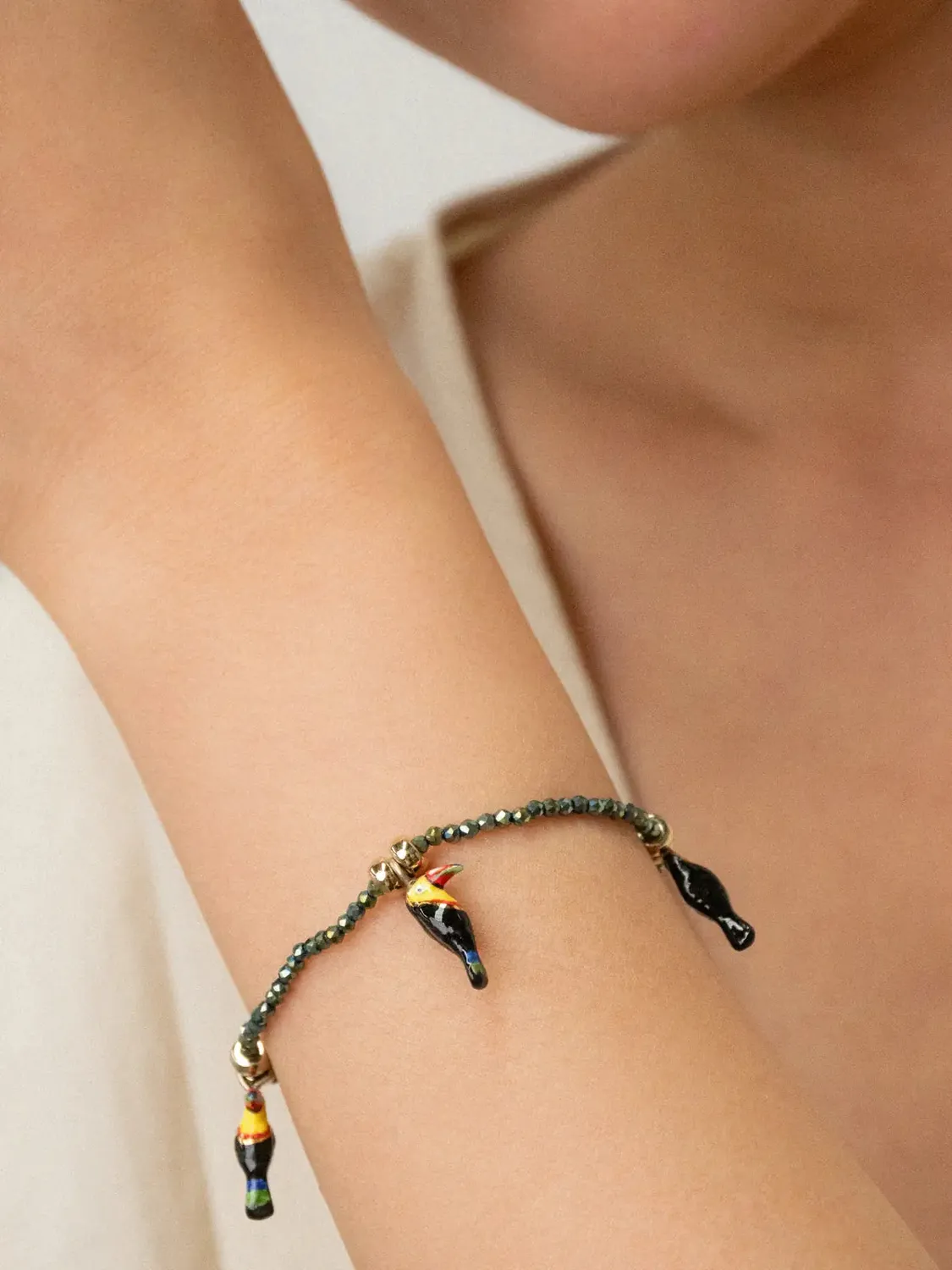 Nach Bijoux Toucans bracelet perles hématite élastique