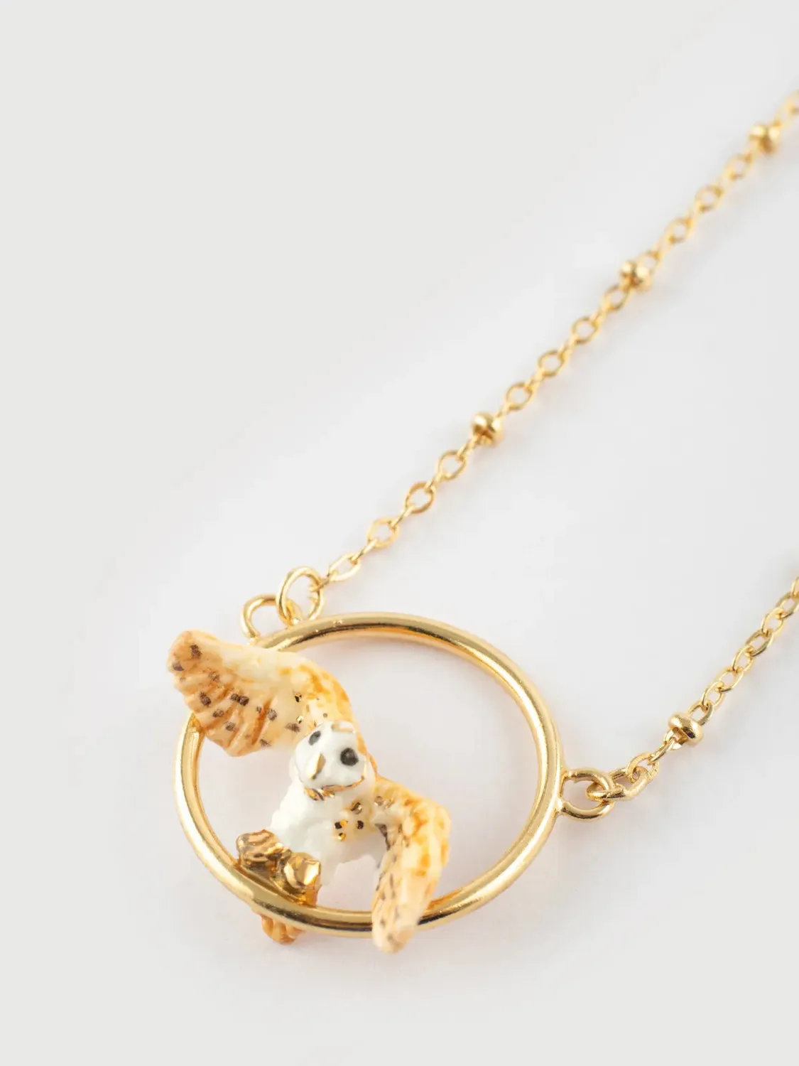 Nach Bijoux Collier chouette en vol porcelaine dorée
