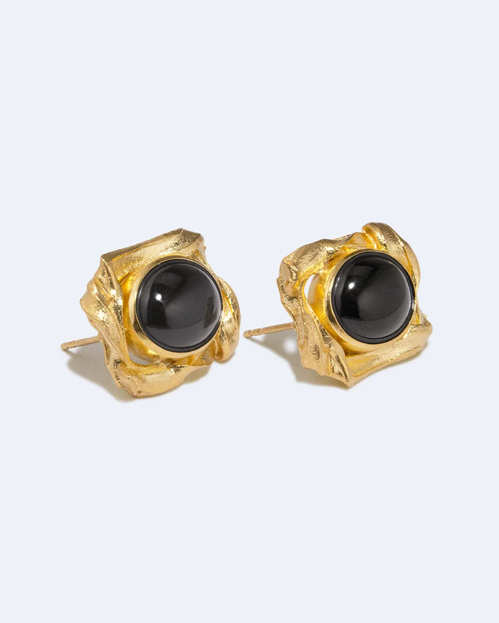 Completedworks SS26 Galileo boucles résine noire vermeil