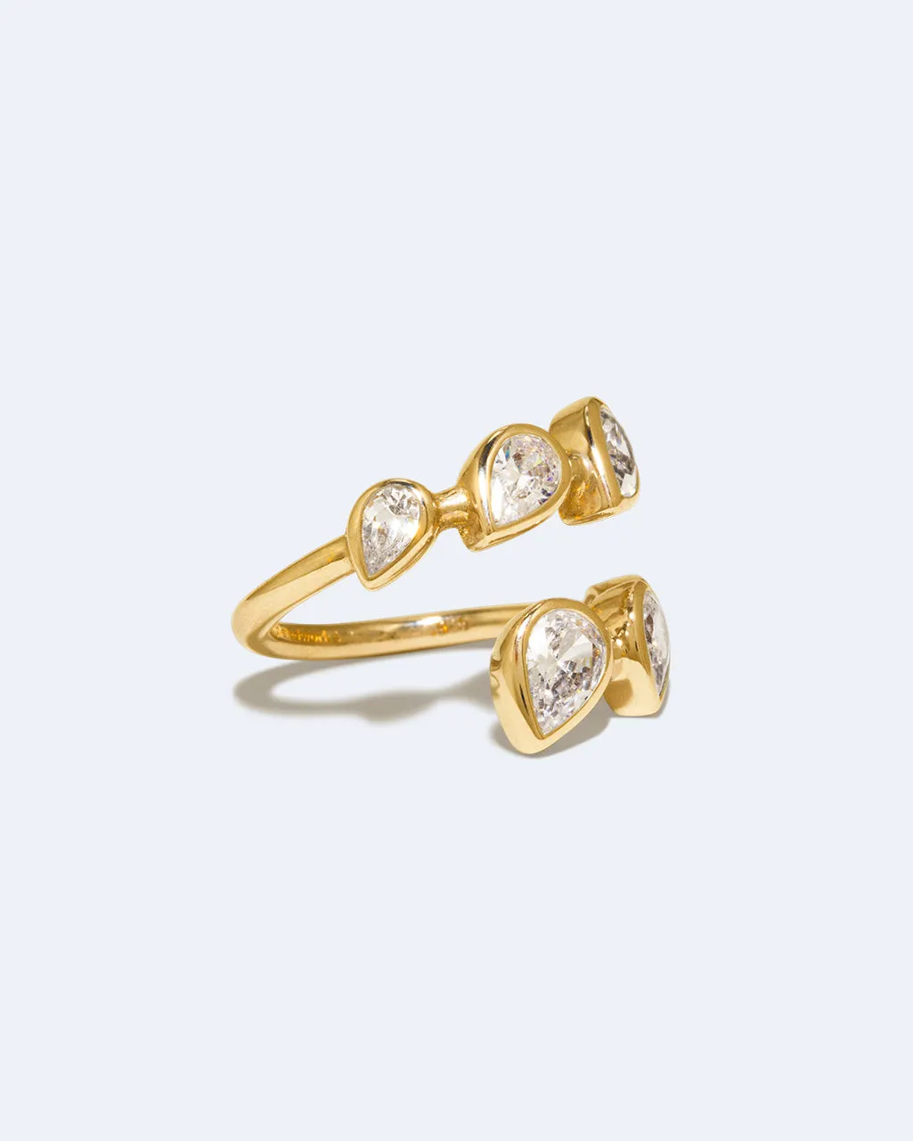 Completedworks Arc bague ouverte zirconia dorée