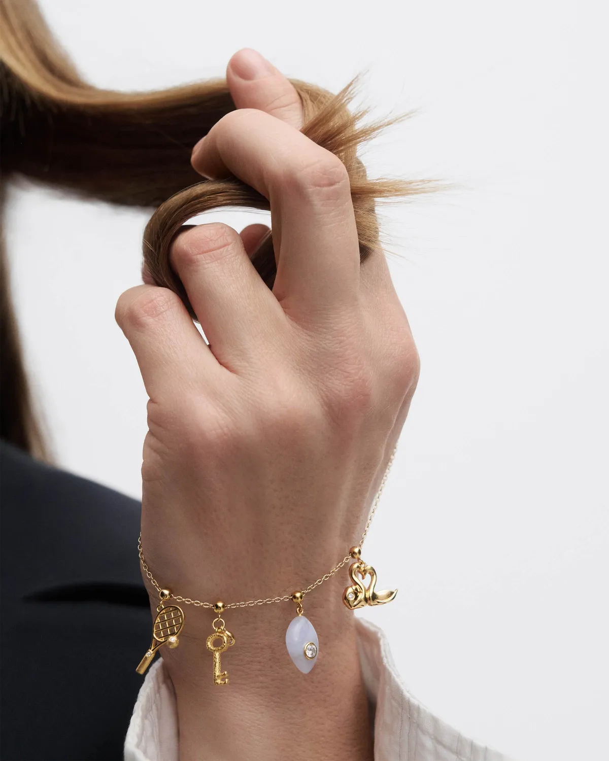 PDPAOLA Charms breloque tennis dorée zirconia blanche
