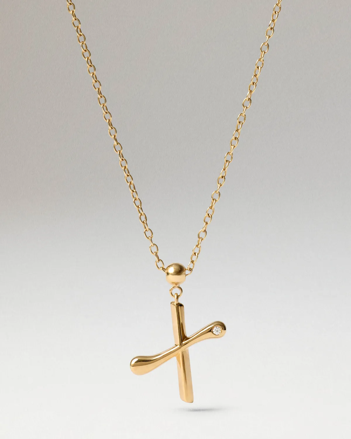 PDPAOLA Initial X charm doré 18 mm zirconia blanche