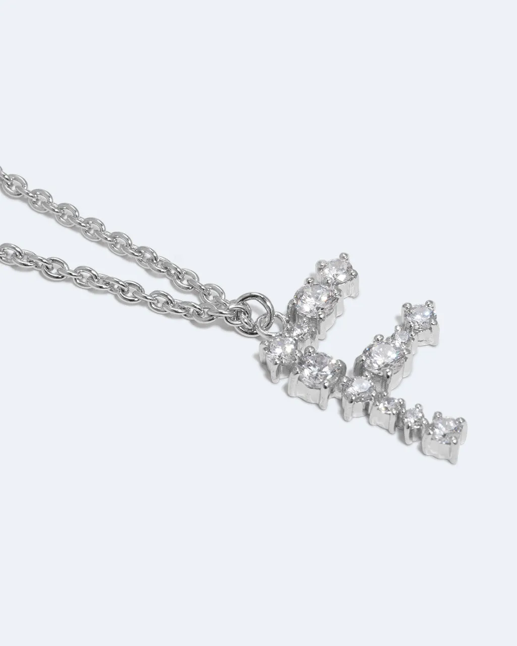 Completedworks Glitchy F Pendentif lettre zircon rhodié