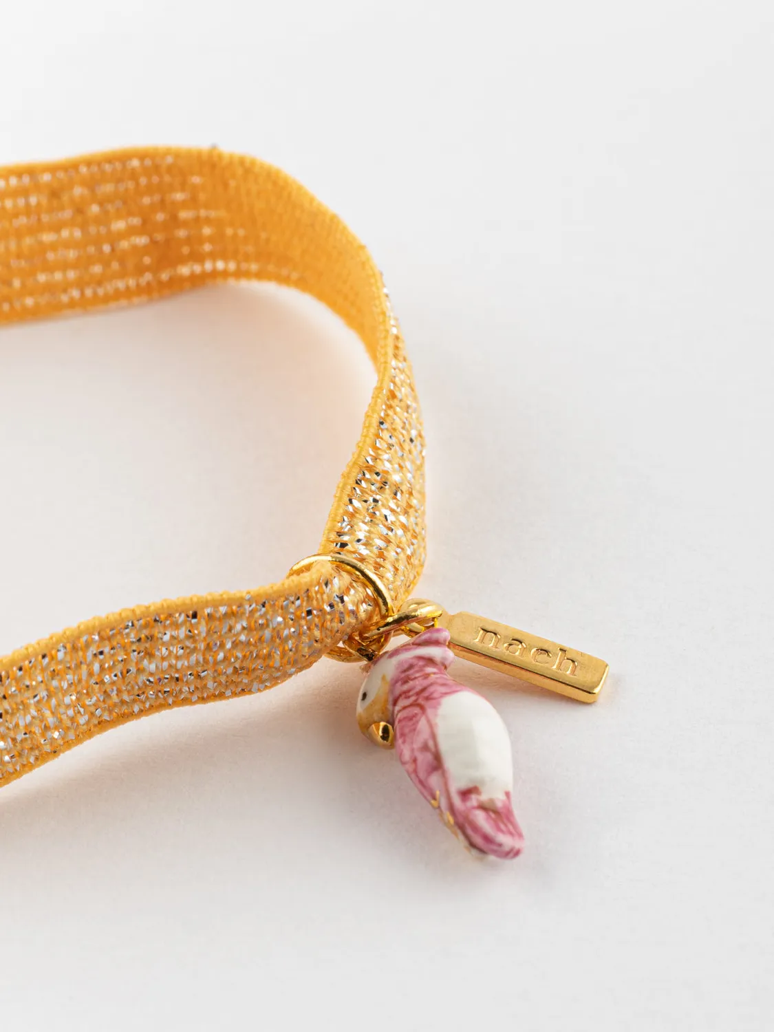 Nach Bijoux cacatoès rose bracelet élastique irisé