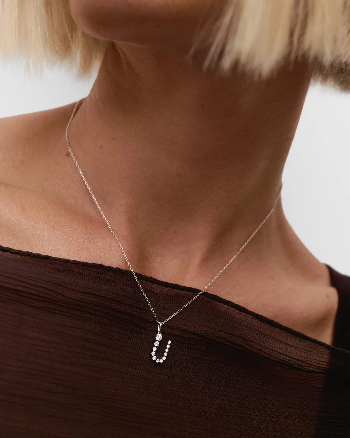 PDPAOLA Initiale U pendentif or blanc diamants