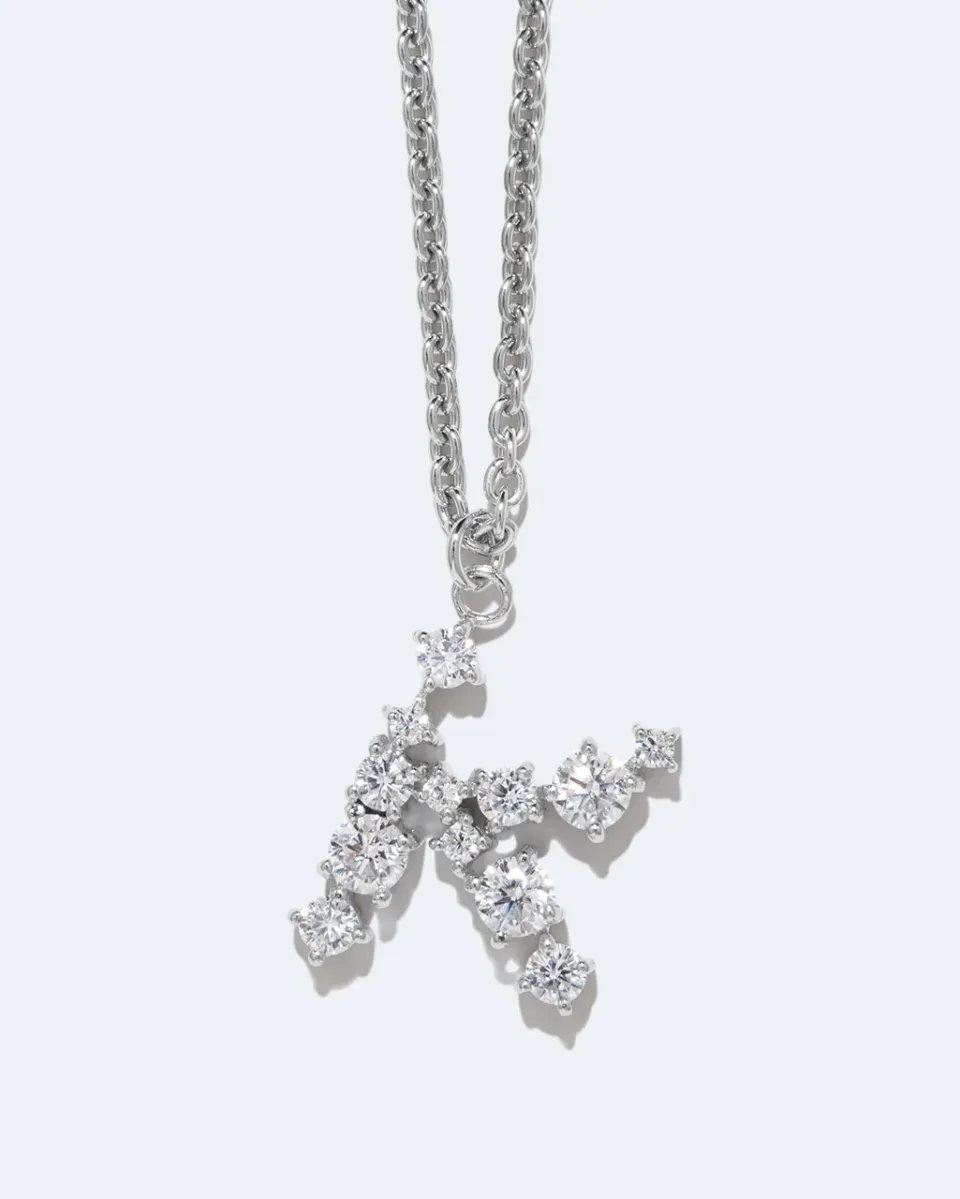 Completedworks Glitchy K collier pendentif zirconia