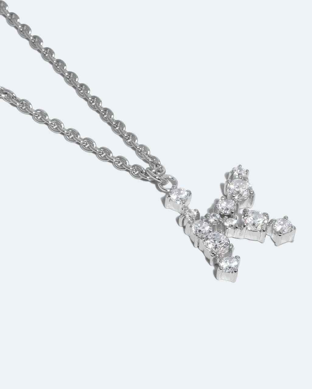Completedworks Glitchy K collier pendentif zirconia
