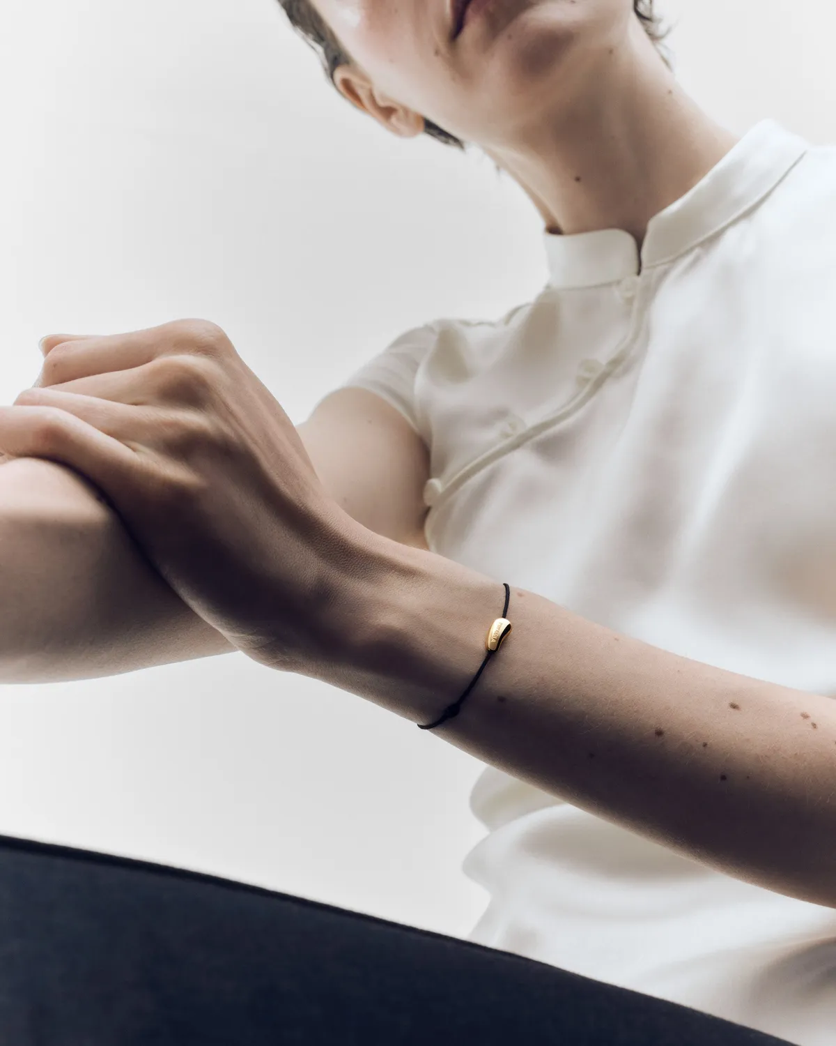 PDPAOLA Rodeo bracelet cordon noir doré