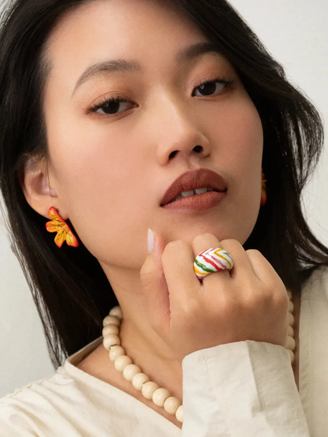 Nach Bijoux puces demi lys tigrée orange porcelaine