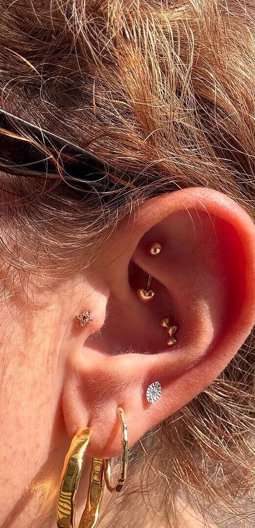 Astrid & Miyu Heart Rook Bar piercing or massif cœur