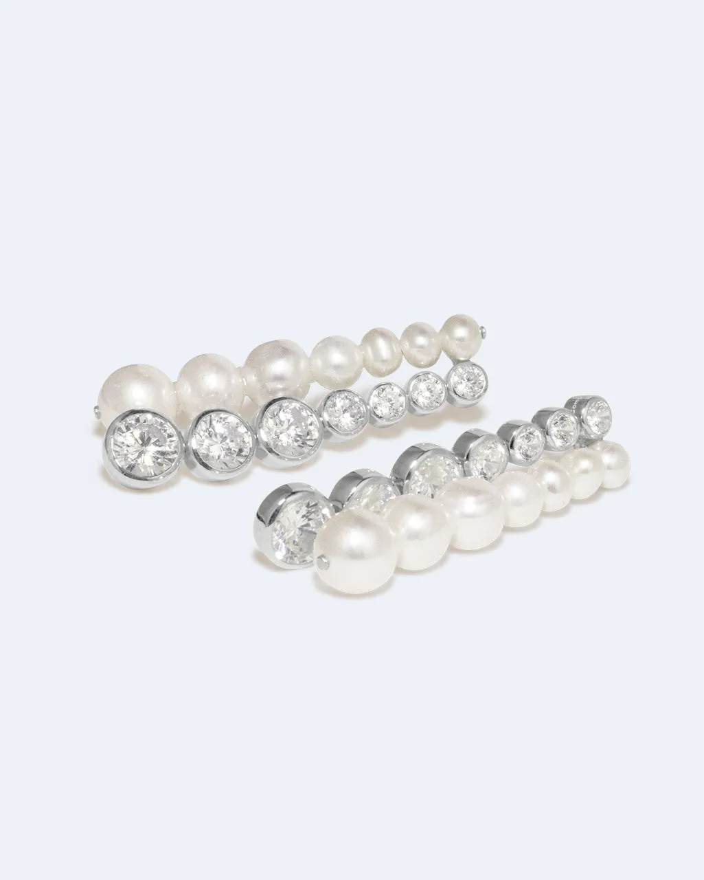 Completedworks The Mirage boucles d'oreilles perles zirconia