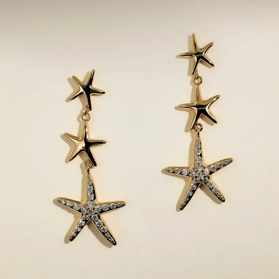 Astrid & Miyu Starfish boucles pendantes dorées