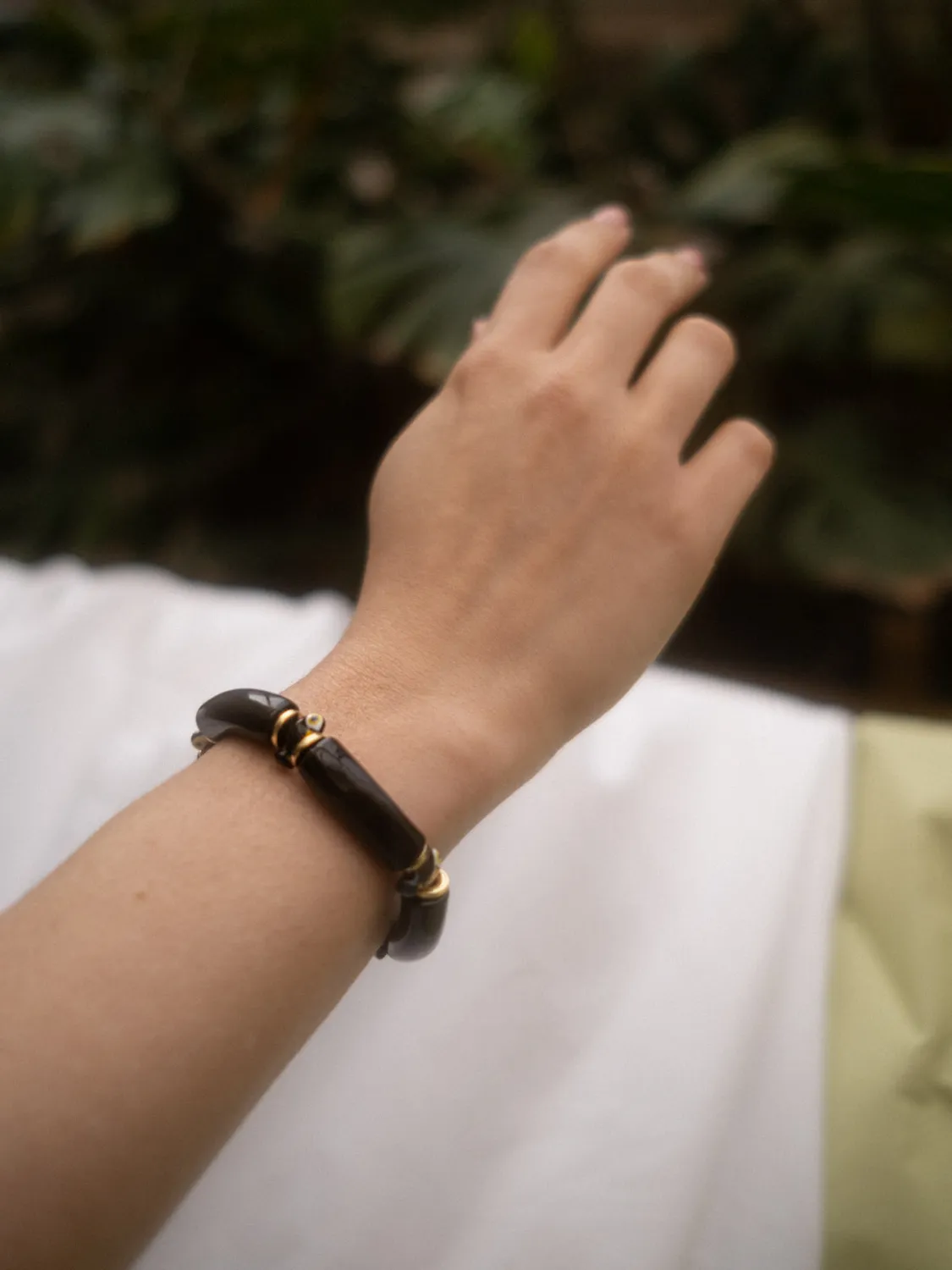Nach Bijoux Toucan bracelet perles noires porcelaine